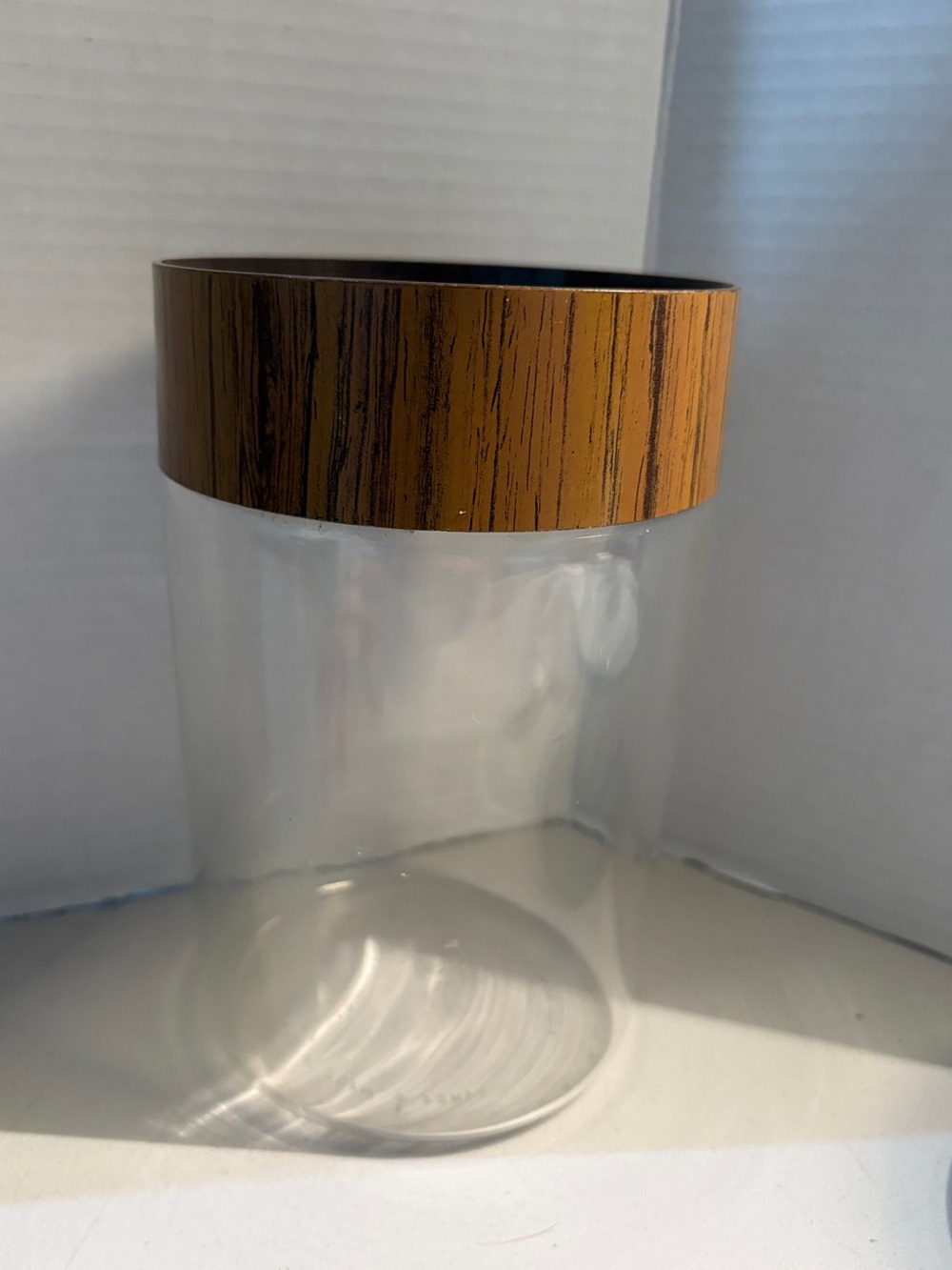 Vintage 1970s Pyrex canister with wood grain lid 7”
